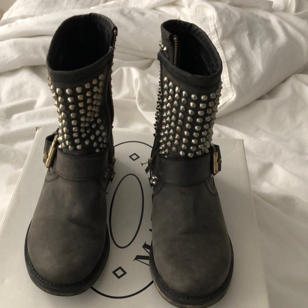 Black boot with strap.